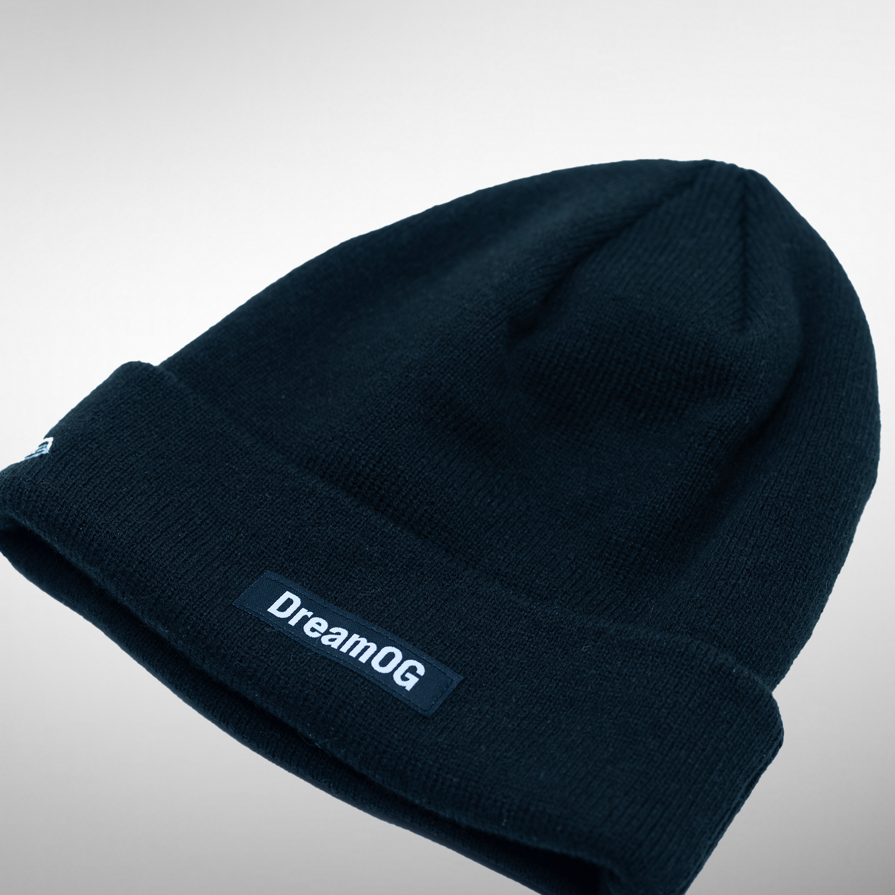 Backside view of the beanie featuring 'DreamOG' slogan.