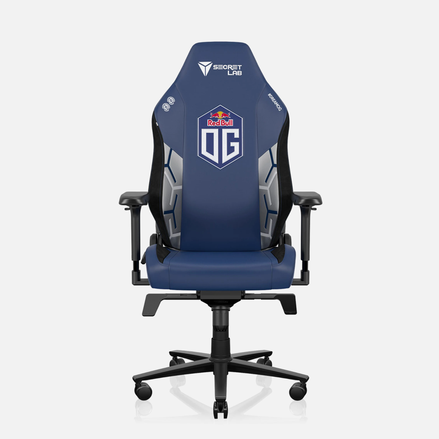 Secretlab gaming chair in dark blue fabric, designed for Esports Team OG, featuring an ergonomic build with adjustable armrests and a prominent OG team logo on the backrest. The chair is set against a white background, highlighting its sleek and premium appearance.